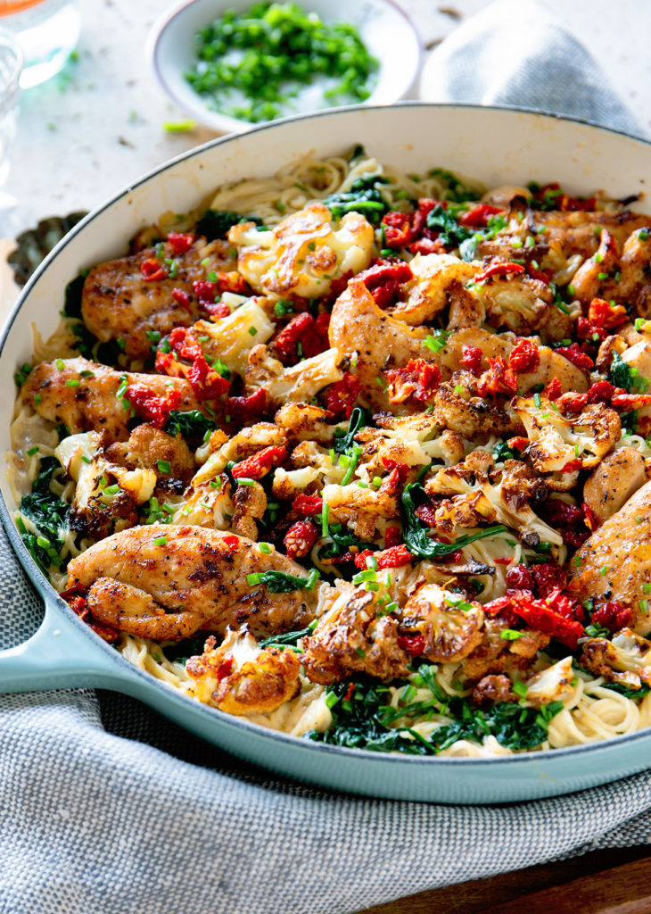 https://realfoodbydad.com/wp-content/uploads/2019/02/Creamy-Chicken-and-Roasted-Cauliflower-Pasta-with-Cauliflower-and-Sundried-Tomatoes-via-Real-Food-by-Dad-730x1024.jpg